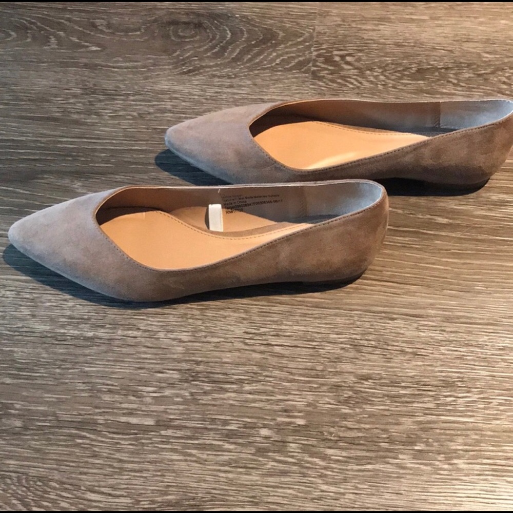 Pointed toe brown suede flats